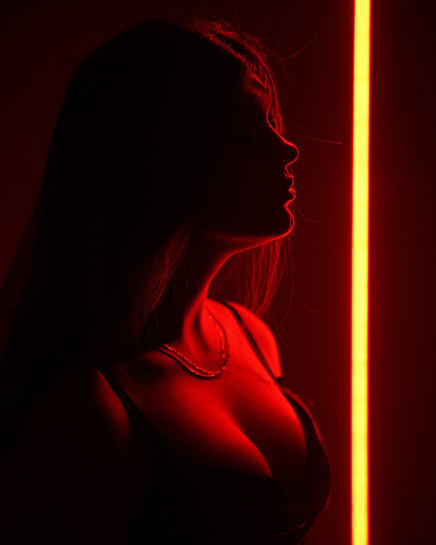 Sexy Woman in Lingerie in Red Lights